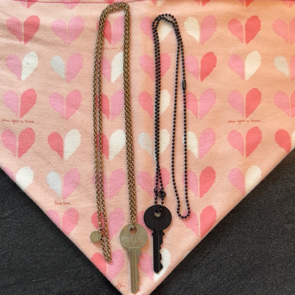 The Giving Keys Gold and Black Key Necklaces